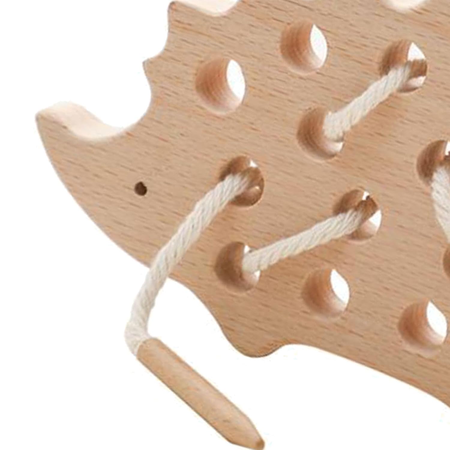 Close-up of the wooden hedgehog lacing toy showing threaded holes and wooden needle