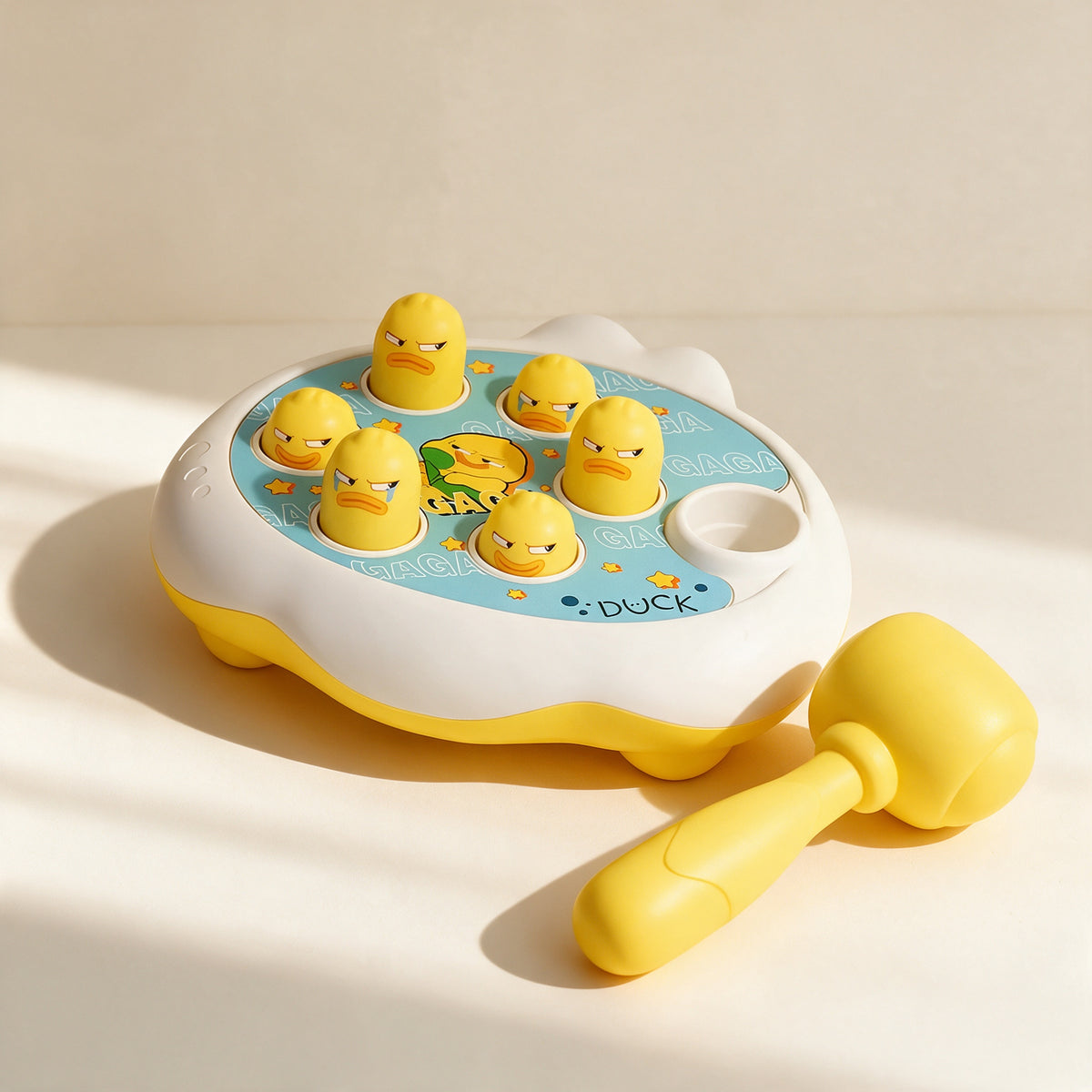 Duck whack-a-mole hammering toy with its soft yellow hammer